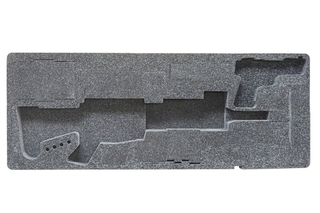 Precision-cut dark foam insert with shaped cavities